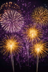 Obraz premium Golden and Purple Fireworks Display in the Night Sky – Festive Celebration