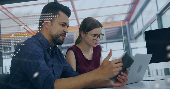 Image of financial data processing over diverse colleagues discussing work in office