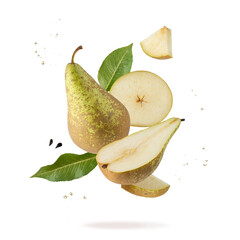 Fresh whole and sliced pear Conference with leaves, seeds and drops falling flying isolated on white background.