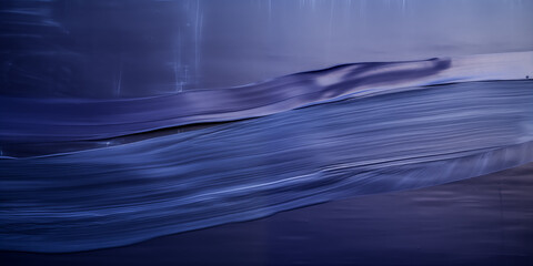 A serene wave captured in calming blue tones, evoking tranquility and peace.