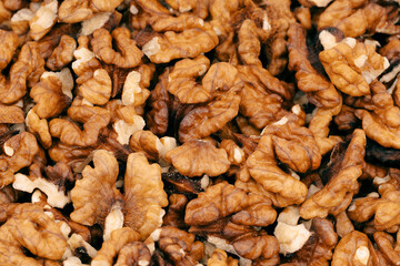 Walnut kernels isolated on white background. Walnuts close-up. Healthy eating. Half of walnut isolated. Peeled walnut on white.