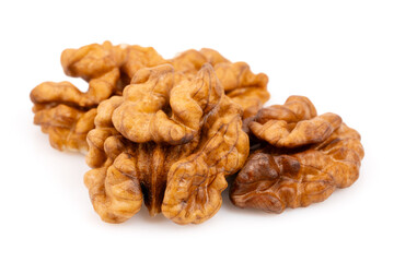 Walnut kernels isolated on white background. Walnuts close-up. Healthy eating. Half of walnut isolated. Peeled walnut on white.