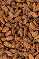 Raisins on a white background. Dried grapes.