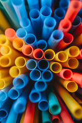 Bright Multicolored Plastic Drinking Straws Arranged in a Radial Pattern