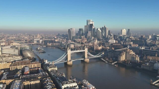 Stunning aerial drone footage of Tower Bridge and London&rsquo;s modern skyline. A sweeping panoramic view capturing the city&rsquo;s iconic blend of history and innovation. A unique perspective!.