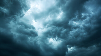 with heavy storm clouds and subtle light breaking through the overcast atmosphere 