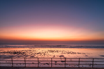 Sunset and dusk scene at St Ouen's Bay, Jersey in the Channel Islands © Tom Richards