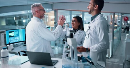 Happy people, scientist and night with high five for discovery, scientific breakthrough or teamwork at lab. Group, success or forensic workers winning with tablet or microscope for science research