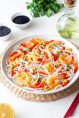Rice noodles with shrimp, pepper and corn. Seafood. Asian cuisine.