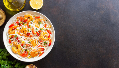 Rice noodles with shrimp, pepper and corn. Seafood. Asian cuisine.