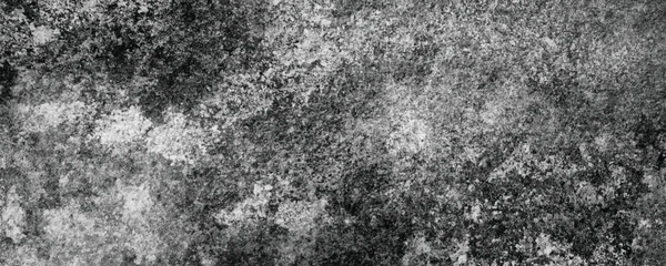 A Close-Up of a Naturally Worn and Darkened Concrete Surface with a Grunge Aesthetic


