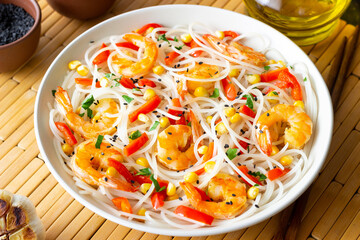 Rice noodles with shrimp, pepper and corn. Seafood. Asian cuisine.