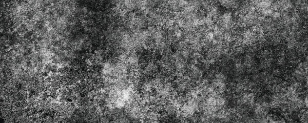 The Industrial Elegance of a Deeply Scratched and Textured Dark Concrete Surface

