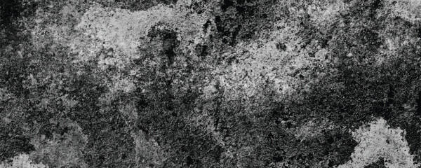 The Industrial Elegance of a Deeply Scratched and Textured Dark Concrete Surface

