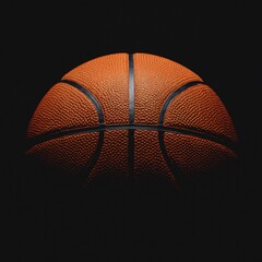 Orange Basketball Highlighted Against Black Background in Dramatic Lighting Effect