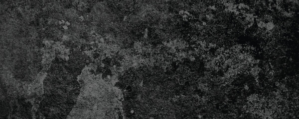A Heavy and Dramatic Aesthetic Created by the Dark and Worn Surface of an Aged Wall


