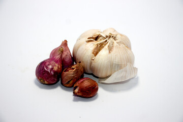 onion and garlic on a white background