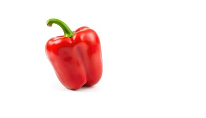 Single vibrant red bell pepper isolated on pure white background, capsicum,  vegetable photography