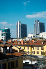 Urban Skyline of Milan with Traditional Rooftops and Modern Skyscrapers