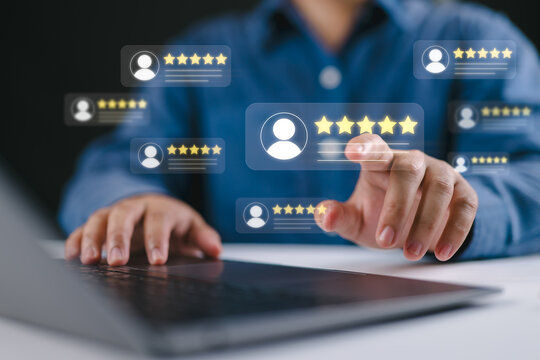 Customer feedback and review good rating concept, man in a business suit interacting with floating digital 5-star customer reviews. testimonial and testimony, user comment and feedback for review.