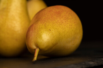 delicious yellow pears with a red side