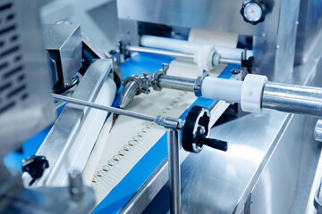 Automated dough formation in confectionery production line