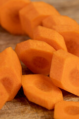 sliced orange carrots on the table during cooking