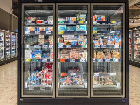 Germany Berlin February 19, 2025 A display of frozen food in a store. The display is in a walk in freezer. There are many different types of food on display