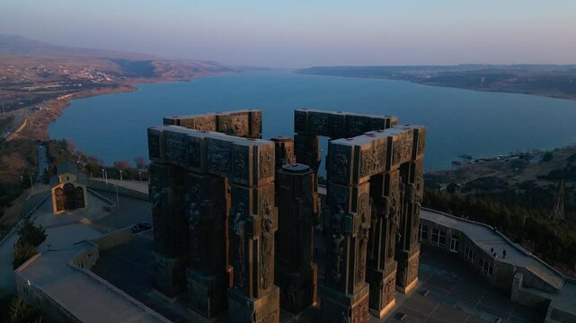 Drone View of the Chronicle of Georgia Monument at Sunset