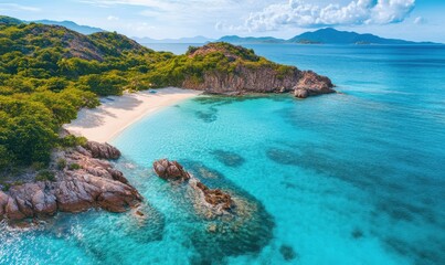 Obraz premium A serene tropical island surrounded by clear blue waters.