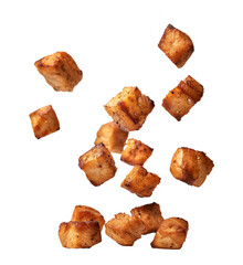 Falling roasted chicken cubes isolated on transparent background