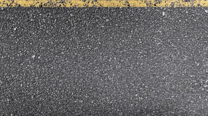 Fototapeta premium Close-up of asphalt road surface with yellow line for urban texture background concept