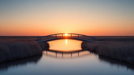 Serene Sunrise Over Wooden Bridge Reflecting in Calm Water