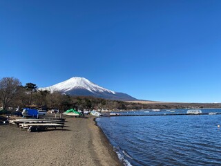  serene view of Mount Fuji reflected in the calm waters of Lake