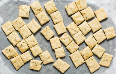 Overhead view of homemade crackers, top view of freshly baked cracker biscuits, process of making...