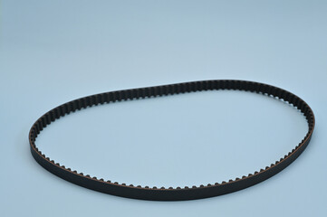 timing belt on a blue background. close-up 