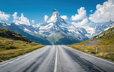Naklejka premium Snowy Swiss Mountain Pass Under A Bright Blue Sky