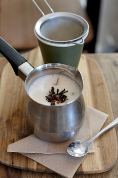 Chai latte prepared on table in cafe