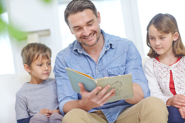 Education, learning or storytelling with father and kids on sofa in living room together for...