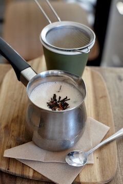Chai latte prepared on table in cafe