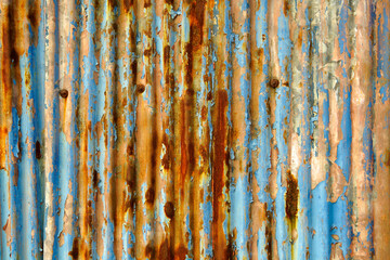 Weathered Blue and Rusty Metal Surface with Stripes and Texture