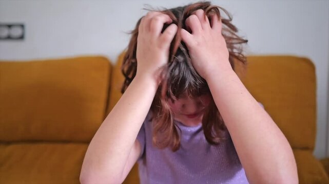 Child experiences itching and scratching due to lice infestation at home