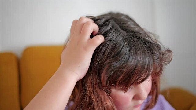 Childhood struggles with itching and scratching from lice infestation