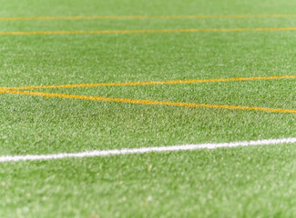 Artificial turf field with vibrant lines for sports activities and training sessions