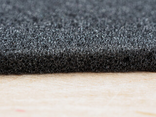Polyurethane foam material for noise insulation and packaging, efficient and lightweight, ideal for sound protection.