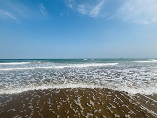 Blue sea horizon, beautiful natural color of the water, sandy beach, no people 