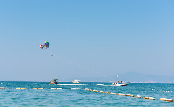 Parasailing water sport in Xunliao Bay, Huizhou City, Guangdong Province, China, during January