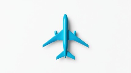 A light blue toy airplane is positioned centrally against a stark white background. The overhead shot emphasizes the plane's details, creating a simple yet striking image.