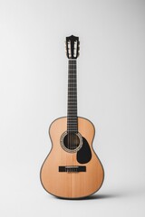 lone acoustic guitar stands upright on plain white background strings ready to resonate with melody
