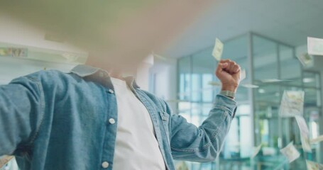 Money rain, success and man celebrate winning lotto, prize and victory in creative startup office. Cash, reward and excited business person cheers for financial freedom, rich and wealth with dollars